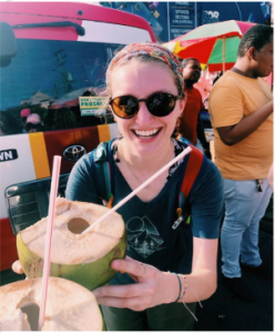 girl-holding-coconut-with-straw